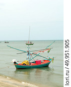 Fishing trawler on the water, Thailand. Стоковое фото, агентство Ingram Publishing / Фотобанк Лори