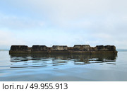 The underwater Buddhist church of Sangklaburi, Thailand. Стоковое фото, агентство Ingram Publishing / Фотобанк Лори
