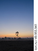 beautiful sunset over agricultural site. Стоковое фото, агентство Ingram Publishing / Фотобанк Лори