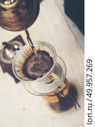 coffee drip process, vintage filter image, slow bar. Стоковое фото, агентство Ingram Publishing / Фотобанк Лори