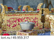 Traditional Balinese musical percussion instrument - brass xylophone Jegog with hammer, part of orchestra Gamelan. Arts, Music and culture of Bali and Indonesian people and asian travel backgrounds. Стоковое фото, агентство Ingram Publishing / Фотобанк Лори