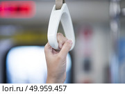Handle bars in train. Стоковое фото, агентство Ingram Publishing / Фотобанк Лори