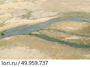 Meandering brook is running over pebbles. Стоковое фото, агентство Ingram Publishing / Фотобанк Лори
