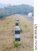 roadside pillar in the surface of natural road. Стоковое фото, агентство Ingram Publishing / Фотобанк Лори