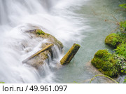 Deep forest waterfall at Huay Mae Kamin National Park Kanjanaburi Thailand. Стоковое фото, агентство Ingram Publishing / Фотобанк Лори