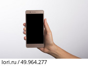 Close Up of a woman holding on mobile phone isolated on white ba. Close Up of a woman holding on mobile phone isolated on white background. Стоковое фото, агентство Ingram Publishing / Фотобанк Лори