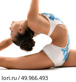 Young female gymnast doing side splits in profile. Стоковое фото, фотограф Гурьянов Андрей / Фотобанк Лори