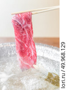Beef Wagyu A5 Shabu shabu with steam, Groumet Japanese hot pot cuisine. Стоковое фото, агентство Ingram Publishing / Фотобанк Лори