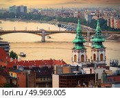 Margaret bridge and St Anna Church in Budapest at sunset, Hungary. Стоковое фото, агентство Ingram Publishing / Фотобанк Лори