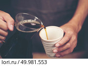 Drip brewing, filtered coffee, or pour-over is a method which involves pouring water over roasted, ground coffee beans contained in a filter. Стоковое фото, агентство Ingram Publishing / Фотобанк Лори