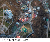 Top of view of St. Andrew’s Church or the Cathedral of St. Andrew in sity Kyiv, Ukraine. Drone photo. St. Andrew’s Church and architecture from above of Kiev. Стоковое фото, агентство Ingram Publishing / Фотобанк Лори