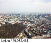 Kiev, Ukraine - April 7, 2018: Beautiful view of the city.University of Taras Shevchenko, St. Vladimir’s Church and the Botanical Garden in the spring. Drone photography. Kiev, Ukraine - April 7, 2018: aerial view panoramic view of the city.University of Taras Shevchenko, Botanical Garden and Vladimir Church. Редакционное фото, агентство Ingram Publishing / Фотобанк Лори
