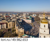 Aerial view of Saint Sophia’s Cathedral tower, bridge, river Dnepro and St.Petersburg. Michaels Golden-Domed Monastery in Kiev, Ukraine. Drone photo. Aerial top view of Kiev city skyline from above, Kyiv cityscape capital of Ukraine. Стоковое фото, агентство Ingram Publishing / Фотобанк Лори
