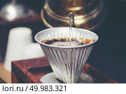 coffee dripping filter process, vintage filter image. Стоковое фото, агентство Ingram Publishing / Фотобанк Лори