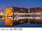 Sunset dusk at UNESCO world heritage site the Royal Albert Dock Liverpool at Pier head in Liverpool England UK. Стоковое фото, агентство Ingram Publishing / Фотобанк Лори