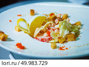 fresh seafood salad with crackers and salmon caviar. Стоковое фото, агентство Ingram Publishing / Фотобанк Лори