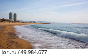 Sand beach in Badalona Catalonia, Spain. It is one of the most popular beach in Europe. Sand beach in Badalona. Catalonia. Стоковое фото, агентство Ingram Publishing / Фотобанк Лори