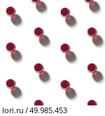 flatlay pattern made of glasses of red wine on a white background. flatlay pattern made of wine glasses with red wine. Стоковое фото, агентство Ingram Publishing / Фотобанк Лори