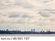 view of the city of Istanbul in the distance. the sky with gray clouds and the sea with ships. beautiful view of the sky, the sea and the city. Стоковое фото, агентство Ingram Publishing / Фотобанк Лори