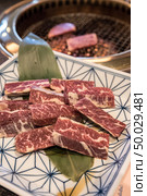 wagyu beef rib premium Japanese  meat BBQ yakiniku. Стоковое фото, агентство Ingram Publishing / Фотобанк Лори