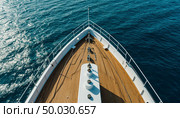 View of the sea from above and the bow of the ship. Generated by AI. Стоковое AI-изображение, AI-художник Анна Никонорова / Фотобанк Лори