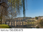 Bridge of Ponte da Barca, ancient portuguese village, on Minho river, north of Portugal. Стоковое фото, агентство Ingram Publishing / Фотобанк Лори