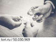 Finally finding solution concept with jigsaw. Стоковое фото, агентство Ingram Publishing / Фотобанк Лори