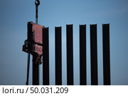 Machines are working in piling. Стоковое фото, агентство Ingram Publishing / Фотобанк Лори