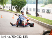 June 24, 2023. Belarusian city of Gomel, Central Park. A man rides a go-kart. Редакционное фото, фотограф Лазаренко Светлана / Фотобанк Лори
