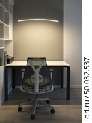 Well-organized ergonomics of workspace in the modern office. Computer table, orthopaedic chair and soft lighting above desk.. Modern office place with comfortable office workspace - computer desk, orthopaedic chair and right artificial light for work. Стоковое фото, агентство Ingram Publishing / Фотобанк Лори