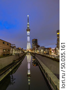 Tokyo skytree sunset in japan. Tokyo Skytree is the highest free-standing structure in Japan and 2nd in the world with over 10million visitors each year. Стоковое фото, агентство Ingram Publishing / Фотобанк Лори