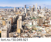 aerial view of Tokyo skylines and skyscrapers buildings in Shinjuku ward in Tokyo. Taken from Tokyo Bunkyo civic center observatory sky desk. . Стоковое фото, агентство Ingram Publishing / Фотобанк Лори