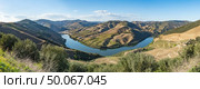 View of the terraced vineyards in the Douro Valley and river near the village of Pinhao, Portugal. Concept for travel in Portugal and most beautiful places in Portugal. Стоковое фото, агентство Ingram Publishing / Фотобанк Лори