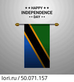 Tanzania Independence day hanging flag background. Стоковая иллюстрация, агентство Ingram Publishing / Фотобанк Лори