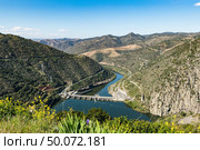 Valeira Dam and surrounding landscape near the village of Sao Joao da Pesqueira, Portugal. Concept for travel in Portugal and most beautiful places in Portugal. Стоковое фото, агентство Ingram Publishing / Фотобанк Лори