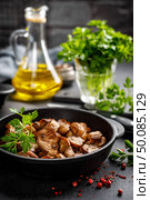 Fried mushrooms, champignons in pan. Стоковое фото, агентство Ingram Publishing / Фотобанк Лори