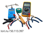 Цифровой мультиметр на белом фоне. Digital  multimeter on a white background. Стоковое фото, фотограф Татьяна Д / Фотобанк Лори