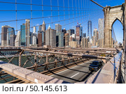 Aerial Lower Manhattan skyscrapers building from Brooklyn bridge in New York City, New York State NY , USA. Стоковое фото, агентство Ingram Publishing / Фотобанк Лори