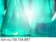 Biofuel research process in laboratory, Microalgae Photobioreactor for alternative energy innovation in Renewable Energy Laboratory. Стоковое фото, агентство Ingram Publishing / Фотобанк Лори