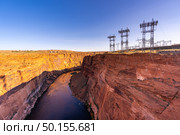 Power plant house and power line over Electricity generating dam with river colorado in Page Arizona USA. Стоковое фото, агентство Ingram Publishing / Фотобанк Лори