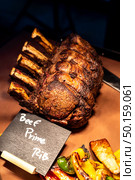 Wagyu beef roast prime rib, Carving food. Стоковое фото, агентство Ingram Publishing / Фотобанк Лори