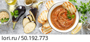 Eggplant hummus with ingredients for cooking. Traditional vegan arabic aubergine appetizer. Baba Ghanoush. Стоковое фото, агентство Ingram Publishing / Фотобанк Лори