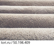 layers of Luxury doormat in shop. Стоковое фото, агентство Ingram Publishing / Фотобанк Лори