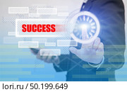 business woman touch SUCCES text on visual screen, business concept. Стоковое фото, агентство Ingram Publishing / Фотобанк Лори