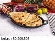 Indian stuffed potato bread Paratha. Стоковое фото, фотограф Андрей Старостин / Фотобанк Лори