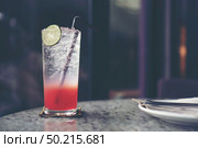 red Italian soda with lemon and strawberry. Стоковое фото, агентство Ingram Publishing / Фотобанк Лори