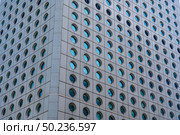 Panoramic and perspective wide angle view to steel blue background of glass high rise building skyscrapers in modern futuristic downtown. Стоковое фото, агентство Ingram Publishing / Фотобанк Лори