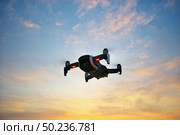 Drone in sky. Technology device. . Стоковое фото, агентство Ingram Publishing / Фотобанк Лори