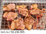 grilled japanese wagyu premium beef yakiniku with red hot charcoal. Стоковое фото, агентство Ingram Publishing / Фотобанк Лори