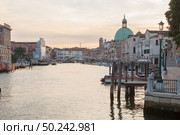 Gorgeous view of the Grand Canal and Basilica Santa Maria della Salute during sunset with clouds, Venice, Italy.. Canal Grande in Venice. Стоковое фото, агентство Ingram Publishing / Фотобанк Лори